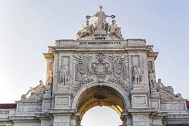 Rua Augusta triumphal Arch, statue detail with Glory rewarding Valor and Genius, seen from Commerce Square, Lisbon, Portugal, Europe