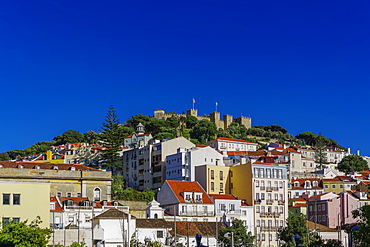 External view of The Castelo de Sao Jorge (St. George Castle) battlements, seen from city centre, Lisbon, Portugal, Europe