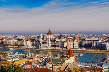 Panoramic day view of neo-Gothic style Orszaghaz Parliament complex landmark on the bank of River Danube, UNESCO World Heritage Site, Budapest, Hungary, Europe