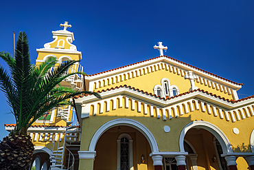 Colourful former Catholic, currently Orthodox, church facade of Mother of God Sissiotissa with bell tower, founded by Saint Francis of Assisi in Argostolion Town, Cephalonia, Ioanian Islands, Greek Islands,  Greece, Europe