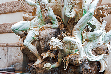 Power at Sea fountain (Die Macht zur See) with marble figures encircling a ship, created by Rudolf Weyr in 1897, Hofburg, Vienna, Austria, Europe