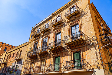 Traditional architecture of houses with iron balconies and decayed facades, Agrigento, Sicily, Italy, Europe