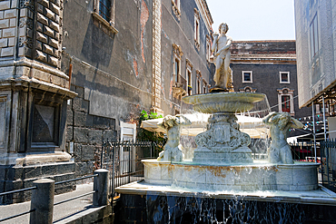 Amenan Baroque Fountain of mythical figures by Tito Angelini and inscribed with the city's coat of arms and a young man holding a cornucopia, Catania, Sicily, Italy, Mediterranean, Europe