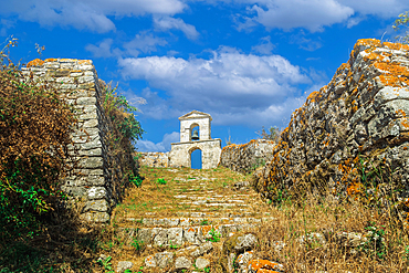 Bell tower against sky with clouds on top of a church at Agia Mavra Fort, Lefkada, Ionian Island, Greek Islands, Greece, Europe