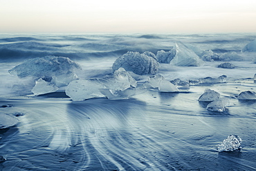 Icebergs on Jokulsarlon black ice beach, Iceland, Polar Regions