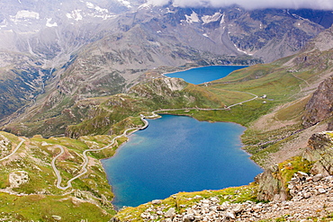 Looking down at Lakes Agnel and Serru from the top of the Nivolet Pass (Colle del Nivolet), Graian Alps, Italy, Europe