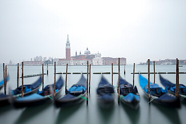 Gondolas in the mist with the Church of San Giorgio Maggiore in the background, Venice, UNESCO World Heritage Site, Veneto, Italy, Europe