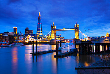 Tower Bridge and The Shard at sunset with a low tide on the River Thames, London, England, United Kingdom, Europe