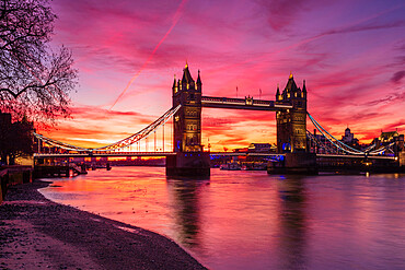 Sunrise view of Tower Bridge from Tower Wharf, Tower of London, London, England, United Kingdom, Europe