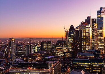 Aerial view of London skyline at sunset, including City of London skyscrapers, London, England, United Kingdom, Europe