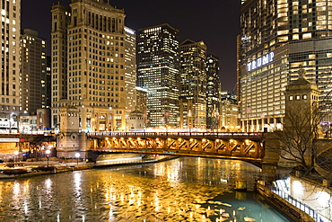 Trump Tower and frozen Chicago River at night, Chicago, Illinois, United States of America, North America