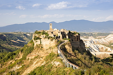 Civita di Bagnoregio, a medieval town perched on volcanic rock, in the afternoon sun, Lazio, Italy, Europe