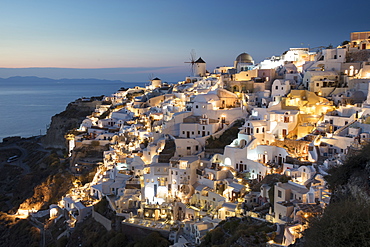 Sunset over Oia, Santorini, Cyclades, Greek Islands, Greece, Europe