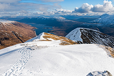 Looking down to Loch Cluanie from the summit of Sgurr an Fhuarail above Glen Shiel in Kintail, Highlands, Scotland, United Kingdom, Europe