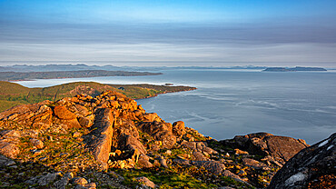 Looking down on the village of Elgol and the Isle of Eigg from the summit of Sgurr na Stri at sunset, Isle of Skye, Inner Hebrides, Scotland, United Kingdom, Europe