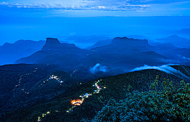 Lights marking the pilgrim trail through the forest to Sri Pada (Adams Peak), an important pilgrim site in Sri Lanka, Asia