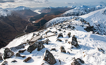 Looking down into Glen Etive and Loch Etive in distance from the summit of Stob Dubh on Buchaille Etive Mor, Highlands, Scotland, United Kingdom, Europe