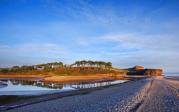 Warm afternoon sun at mouth of the River Otter at Budleigh Salterton, Devon, England, United Kingdom, Europe