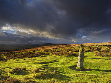 Strong light on the ancient granite Bennett's Cross, Dartmoor National Park, near Moretonhampstead, Devon, England, United Kingdom, Europe