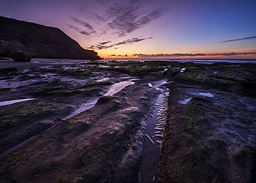 Winter twilight with razor shell and cloud formation, Orcombe Point, Exmouth, Devon, England, United Kingdom, Europe