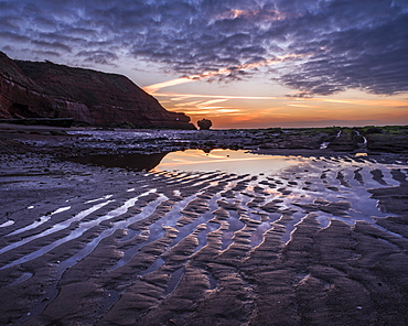 Sand ripples at dawn on the beach at Orcombe Point, Exmouth, Devon, England, United Kingdom, Europe