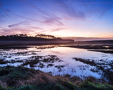 Winter twilight clouds and perfect reflections on the River Otter at Budleigh Salterton, Devon, England, United Kingdom, Europe