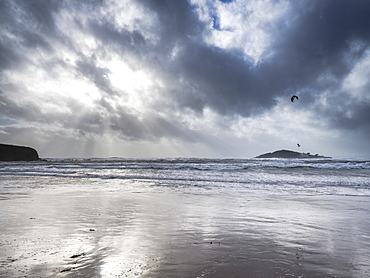 A kitesurfer off the beach at Bantham during a storm, near Kingsbridge, Devon, England, United Kingdom, Europe