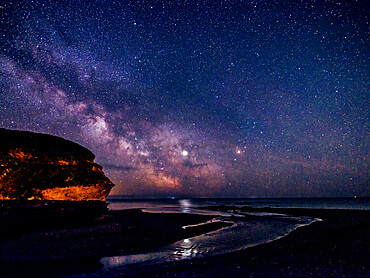 Milky Way and Jupiter beyond Otter Head at Budleigh Salterton, Devon, England, United Kingdom, Europe