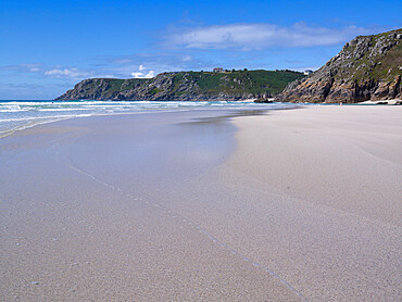 The beautiful and secluded beach at Pedn Vounder overlooks Logan Rock, near Porthcurno, Cornwall, England, United Kingdom, Europe