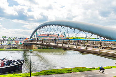 The Bernatka suspension foot bridge over the Wisla (Vistula) River in Krakow, Poland, Europe