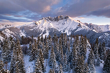 Winter season in Orobie Alps during sunrise, Presolana peak in Bergamo province, Lombardy district, Italy, Europe