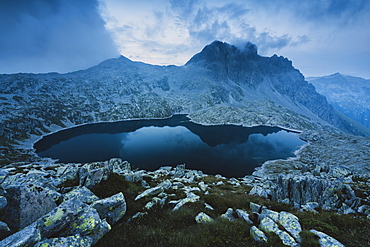 Blue hour at the lake of Vacca in the Adamello Park, Brescia province, Lombardy, Italy, Europe