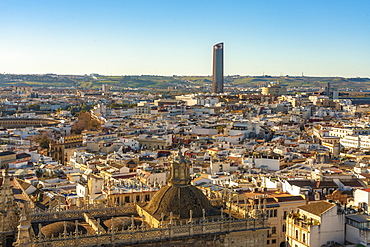 View of the historic center of Seville with Torre Sevilla (Tower of Seville) in the background, Seville, Andalucia, Spain, Europe