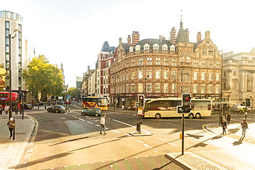 The Strand with the St. Clement Danes, Central Church of The Royal Air Force, in the background on a sunny day, London, England, United Kingdom, Europe