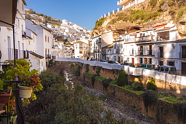 Setenil de las Bodegas with its white historic buildings and the houses under the rock mountain, Setenil de las Bodegas, Province of Cadiz, Spain, Europe