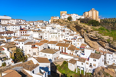 Overview of The Setenil de las Bodegas, with its white historic buildings and the houses under the rock mountain, Setenil de las Bodegas, Province of Cadiz, Spain, Europe