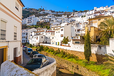 Overview of The Setenil de las Bodegas, with its white historic buildings and the houses under the rock mountain, Setenil de las Bodegas, Province of Cadiz, Spain, Europe