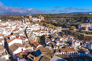 Overview of The Setenil de las Bodegas, with its white historic buildings and the houses under the rock mountain, Setenil de las Bodegas, Province of Cadiz, Spain, Europe