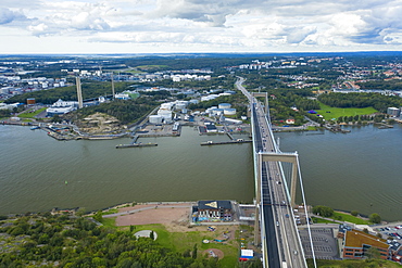 Aerial view by drone of Radasten Art Hall and Alvsborgsbron bridge crossing to Hesingen (Hisingen) Island, Gothenburg, Sweden, Scandinavia, Europe