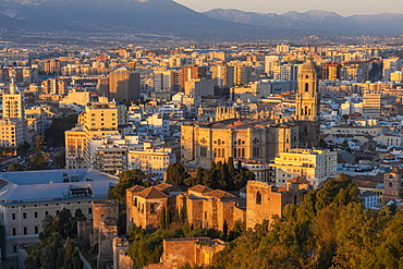 View of city and the Cathedral of Malaga from Alcazaba at sunrise, Malaga, Andalusia, Spain, Europe