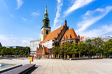 Marienkirche (St. Mary's Church) on Alexander Platz with blue sky, Berlin, Germany, Europe