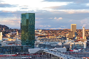 View of Zurich from above with the Prime Tower, Hardbridge and mountains in the background, Zurich, Switzerland, Europe