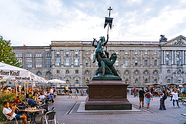 Nikolaiviertel (Nicholas Quarter) at sunset near Alexander Platz with statue of St. George Slaying The Dragon, Berlin, Germany, Europe