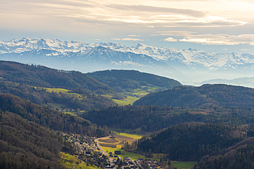 Panoramic landscape view of nature surrounding Zurich with mountains in the background