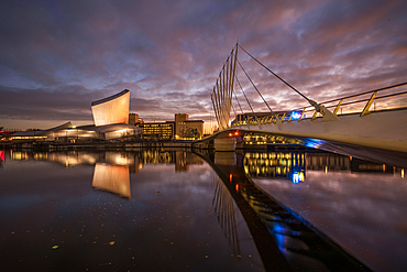 IWM North and swingbridge reflected at night Salford Quays, Manchester