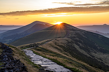 The sun rising above Lose Hill and Back Tor, The Peak District National Park, Derbyshire, England, United Kingdom, Europe