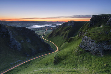 Winnats Pass at sunrise with car light trails, Winnats Pass, Hope Valley, Peak District, Derbyshire, England, United Kingdom, Europe