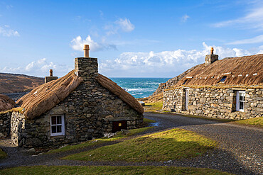 Blackhouse Village, with coastal view at Harris and Lewis Island, Outer Hebrides, Scotland, United Kingdom, Europe