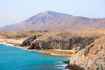 View along coast from cliff top above Playa del Papagayo, Playa Blanca, Yaiza, Lanzarote, Las Palmas Province, Canary Islands, Spain, Atlantic, Europe