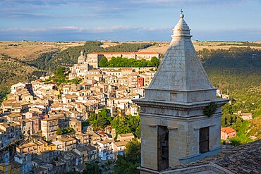 View over sunlit Ragusa Ibla, evening, bell-tower of the Church of Santa Maria delle Scale in foreground, Ragusa, UNESCO World Heritage Site, Sicily, Italy, Europe